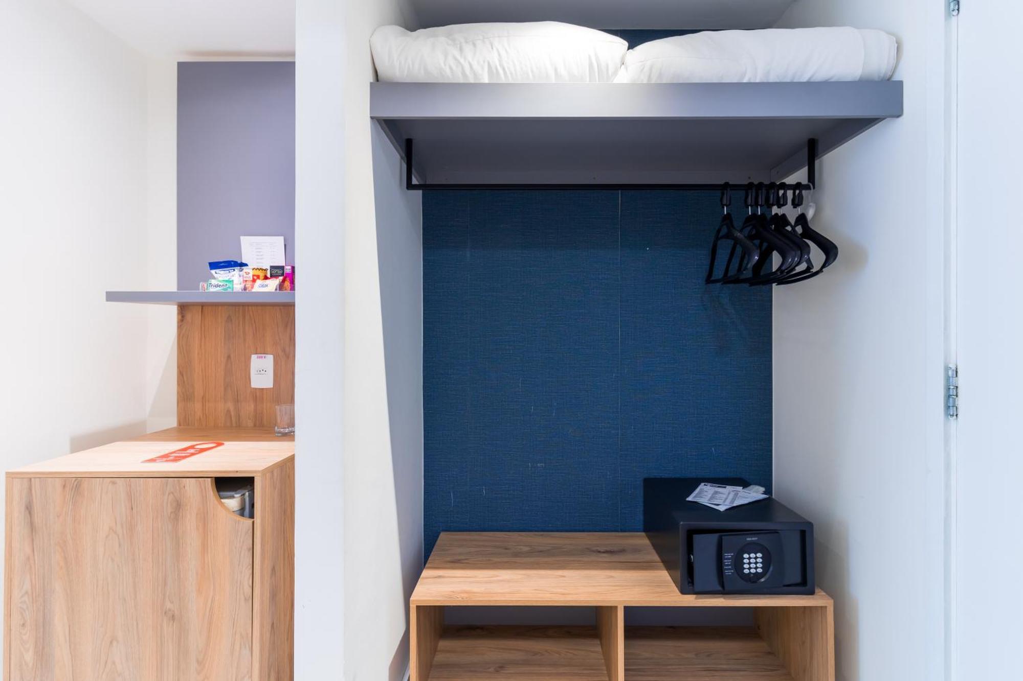 Parque Balneario Hotel Santos By Castelo Itaipava Room photo A typical bedroom in the new halls of residence